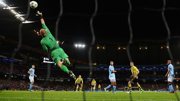 Manchester City Joe Hart makes one of many saves against Borussia Dortmund