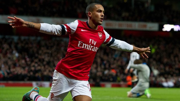 Theo Walcott celebrates putting Arsenal into the lead against Newcastle