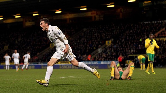 Gareth Bale celebrates after netting an equaliser for Tottenham at Norwich