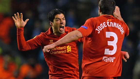 Luis Suarez is congratulated after scoring his second goal of the night for Liverpool against Zenit