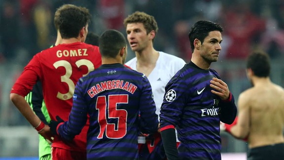 Mikel Arteta looks rueful as Arsenal exit the Champions League