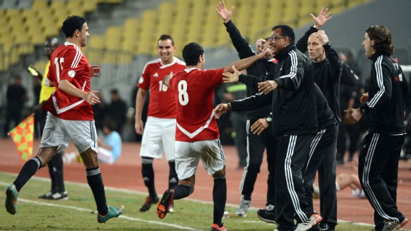 Egypt moved five points clear atop Group G with a late 2-1 win over Zimbabwe