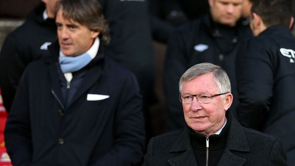 Sir Alex Ferguson Roberto Mancini on the touchline at Old Trafford