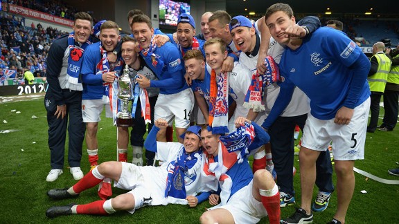 Rangers players toast their Scottish Third Division title win