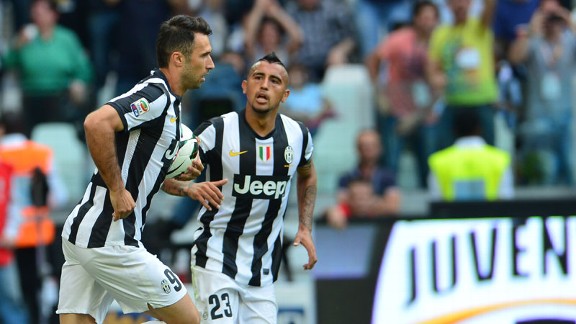 Mirko Vucinic celebrates after netting an equaliser for Juventus