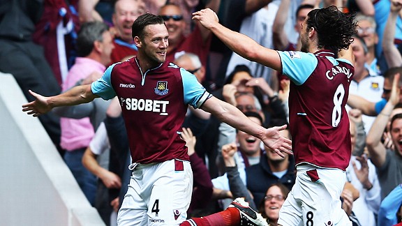 Kevin Nolan celebrates with Andy Carroll after putting West Ham into the lead against Reading
