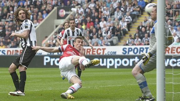 Laurent Koscielny volleys Arsenal into the lead at Newcastle