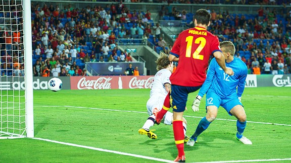 Alvaro Morata scores from the goal line