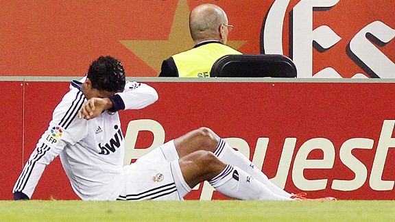 Rafael Varane goes down with a knee injury during May's La Liga game at Espanyol