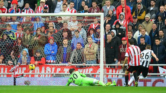 Mathieu Debuchy scores the equaliser for Newcastle.