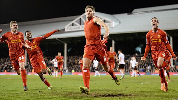 Liverpool celebrate after Steven Gerrard scored their late, late winner at Fulham from the penalty spot.