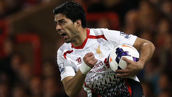 Luis Suarez celebrates after scoring Liverpool's third at Palace.