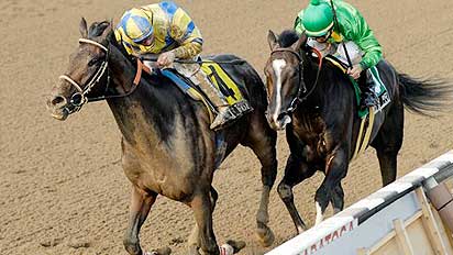 Street Sense battles Grasshopper in the Grade 1 Travers Stakes for 3-year-olds at Saratoga on Aug. 25, 2007.