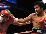 Pacquiao Defeats Cotto Via 12th-Round TKO