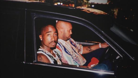 Controversial rapper and Tyson supporter Tupac Shakur is brutally gunned 