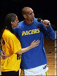 Cheryl and Reggie Miller