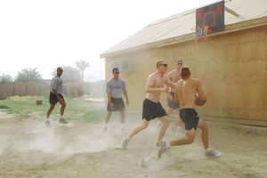 American Infantrymen play basketball in Iraq.