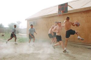 American Infantrymen play basketball in Iraq.