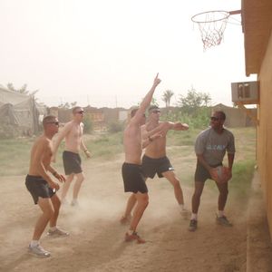 American Infantrymen play basketball in Iraq.