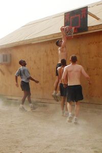 American Infantrymen play basketball in Iraq.