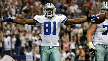 Terrell Owens pulled in two touchdown passes from Tony Romo as the 